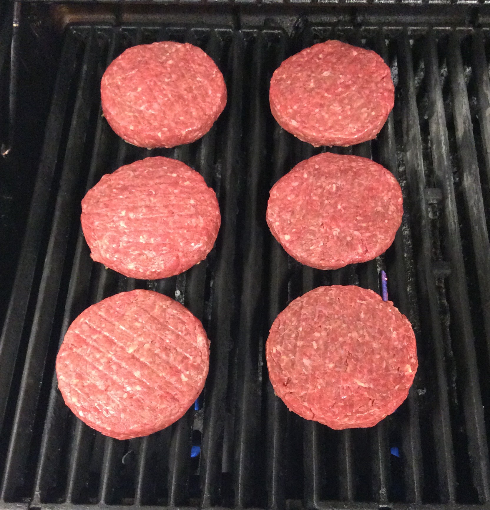 Put the stuffed burgers on the grill